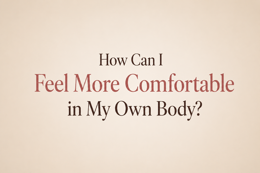 A woman in a calm, softly lit space, representing self-acceptance, body confidence, and intimate wellbeing